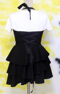 Mala Crna Mini haljina iza